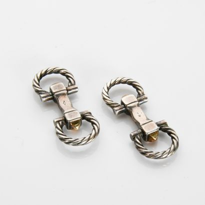 HERMES
Pair of stirrup cufflinks in 925 thousandths...