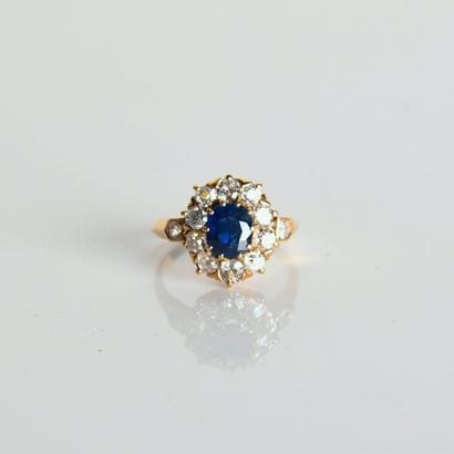 Antique rose gold daisy ring
centered on...