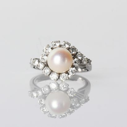Tourbillon ring in 18-carat (750
millies)...