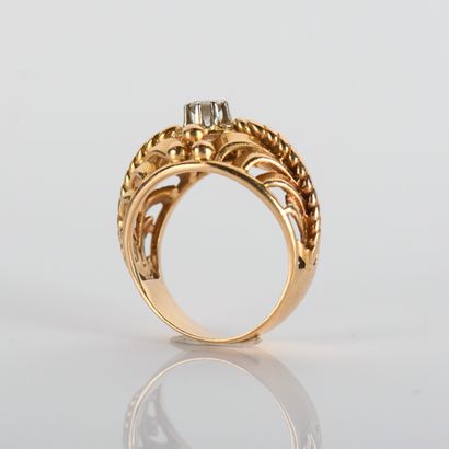 18K (750
yellow gold with openwork scrolling...