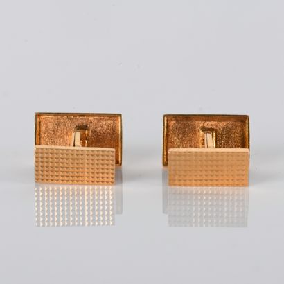 Pair of yellow gold cufflinks with diamond-patterned...