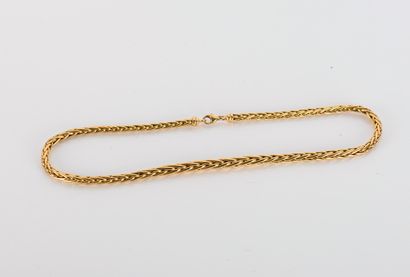 Palm-tree link necklace in 18
yellow gold...