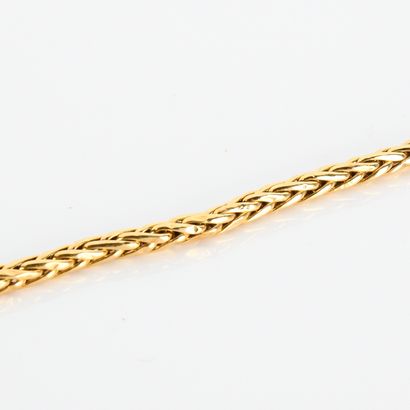 Palm-tree link bracelet in 18-carat yellow...