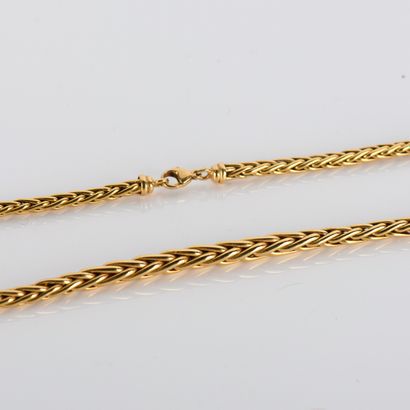 Palm-tree link necklace in 18
yellow gold...
