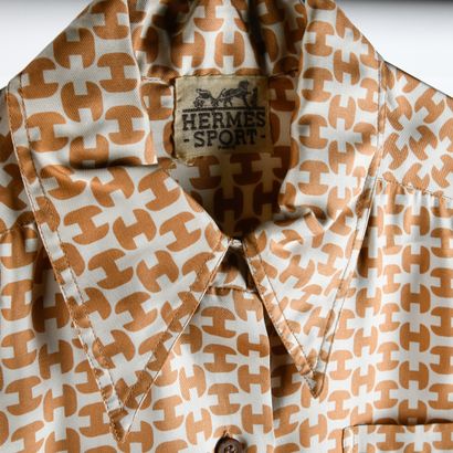 HERMES Sport. Silk blouse decorated with...