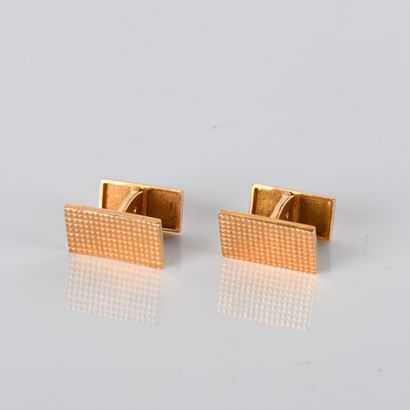 Pair of yellow gold cufflinks with diamond-patterned...