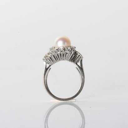 Tourbillon ring in 18-carat (750
millies)...
