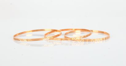 Three bangles in 18-carat yellow gold
(750...