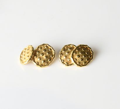 Pair of yellow gold cufflinks
18-carat (750-millimeter)...