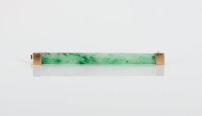 Jade and jadeite brooch on an
18-carat yellow...