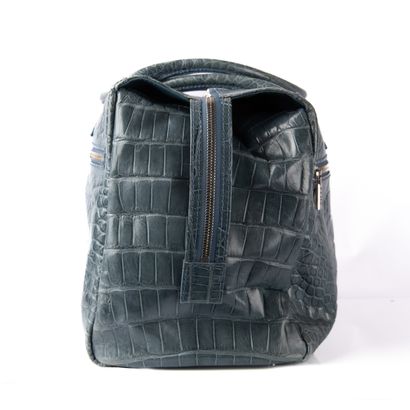 ZILLI
Light blue crocodile travel bag
Silver...