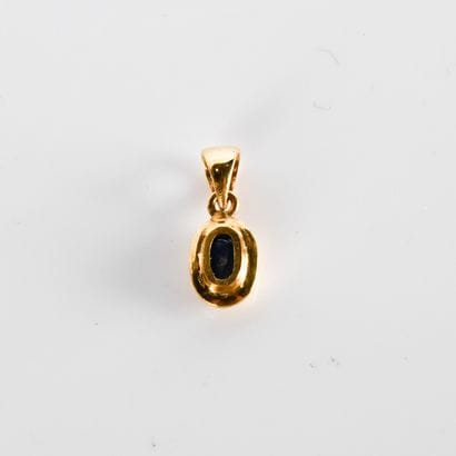 Meeting of a pendant and a ring in gold (750°/00)...