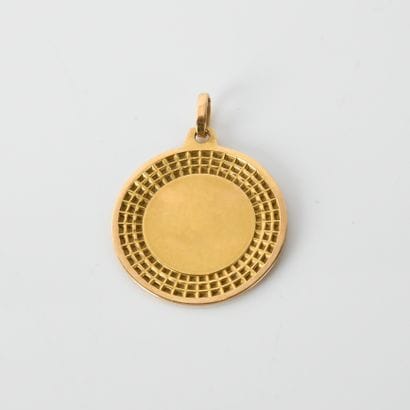 Religious medal in 18-carat yellow gold
(...