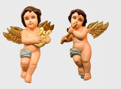 Paire d’angelots décoratifs en bois sculpté...