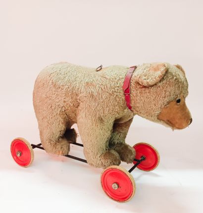 Ours sur roulette de la marque STEIFF 
Yeux...