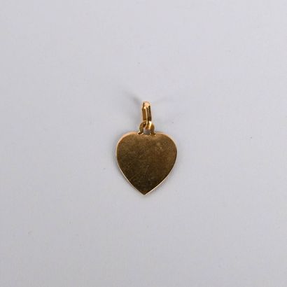 Heart-shaped medal by Augis in 18 K (750°/00...