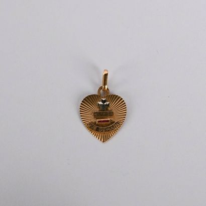 Heart-shaped medal by Augis in 18 K (750°/00...