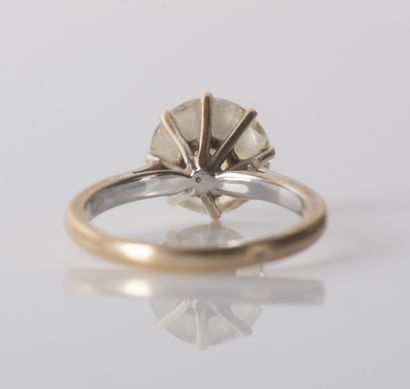 Solitaire set with a demitaille diamond weighing...