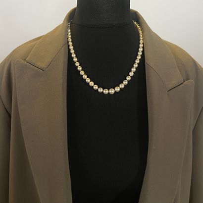 Necklace of falling white cultured pearls,...