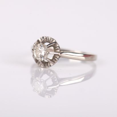 Sun-set solitaire ring with a half-cut diamond
approximately...