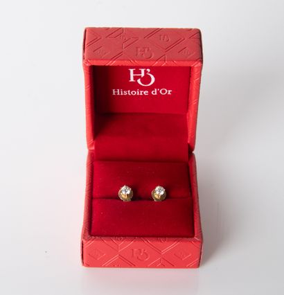 Pair of ear studs in yellow gold
18K (750°/00...