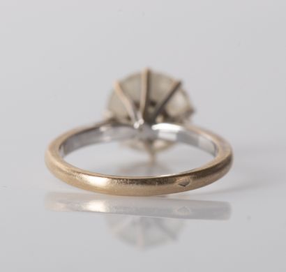Solitaire set with a demitaille diamond weighing...