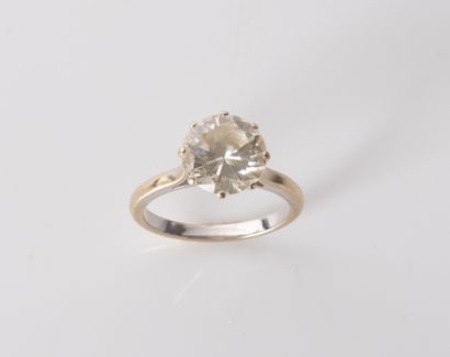 Solitaire set with a demitaille diamond weighing...