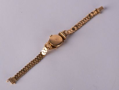 Bracelet montre de dame tout or jaune 18...