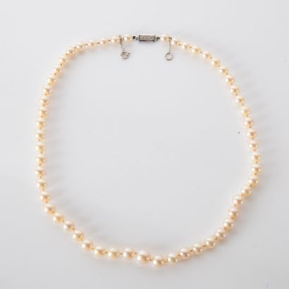 Necklace of falling white cultured pearls,...
