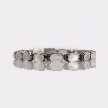 Silver bracelet set with moonstone cabochons...