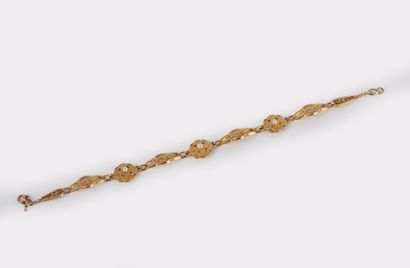 Late 19th-century bracelet in 18K (750°/00)...