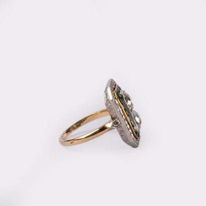 Bague en or jaune et gris 18 K (750°/00 )sertie...