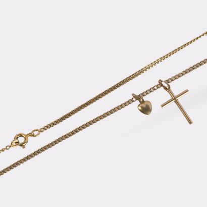 Lot de deux pendentifs en or jaune 18K (750°/00)...
