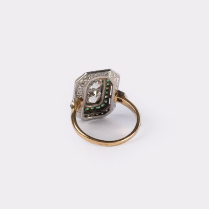 Bague en or jaune et gris 18 K (750°/00 )sertie...