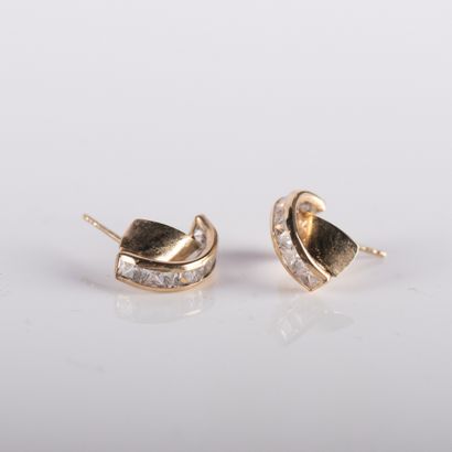 Pair of half hoop earrings set with imitation...