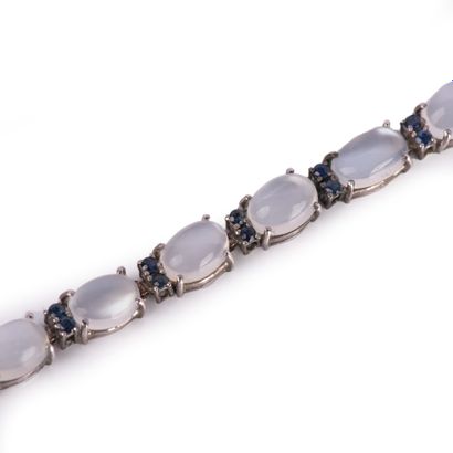 Silver bracelet set with moonstone cabochons...
