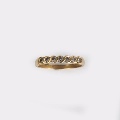 American half wedding band in 18K (750°/00)...