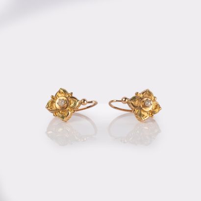 Pair of antique white pearl-centered dormeuses...