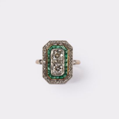 Bague en or jaune et gris 18 K (750°/00 )sertie...