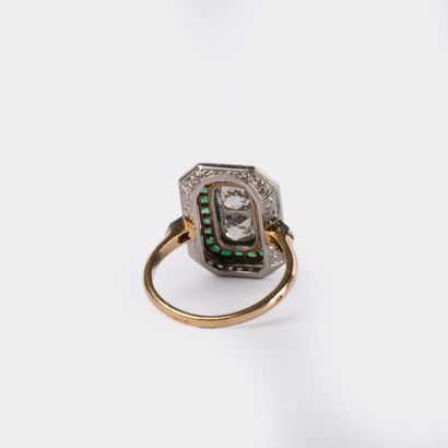 Bague en or jaune et gris 18 K (750°/00 )sertie...