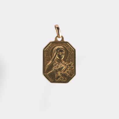 Baptismal medal in 18K (750°/00) yellow gold...