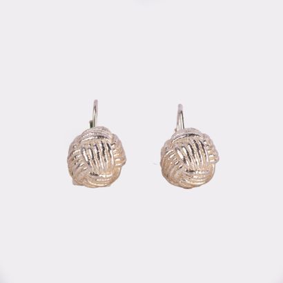 A pair of silver-plated metal sleepers in...