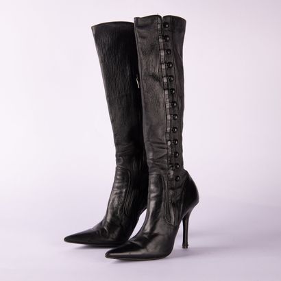 Lot including two pairs of boots and one...