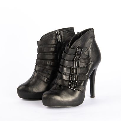 Lot of three pairs of shoes
PRADA. Red leather...