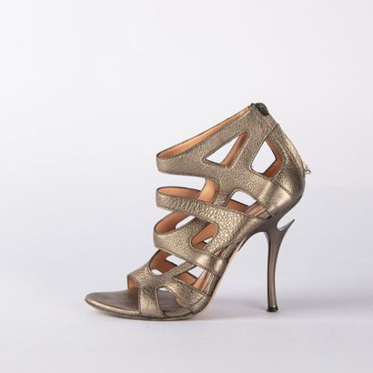 GIANMARCO LORENZI. A pair of gold-tone leather...