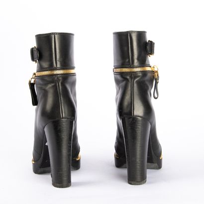 SERGIO ROSSI. Black leather heeled boots,...