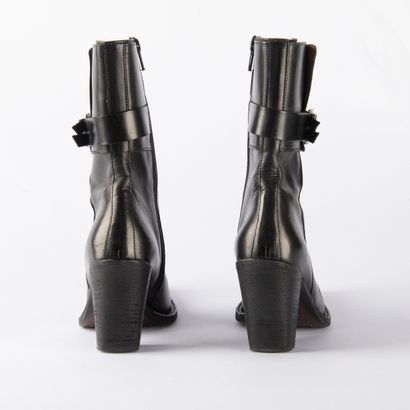Four pairs of black heeled boots. 1/ CHARLES...