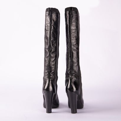 SERGIO ROSSI. Pair of heeled boots in aged-effect...