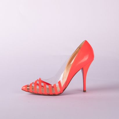 CHRISTIAN LOUBOUTIN. Pair of pumps in neon...