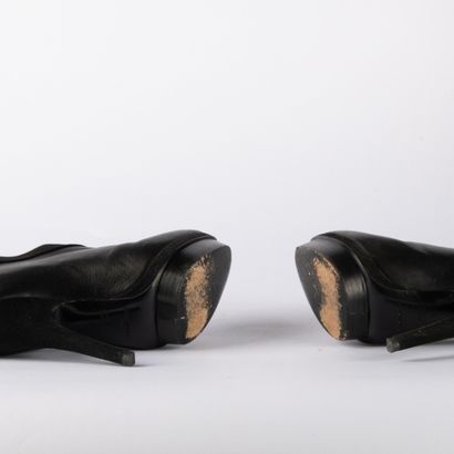 YVES SAINT LAURENT. Pair of heeled ankle...